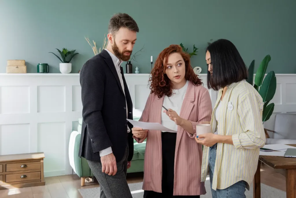 people-having-debate-while-looking-computer